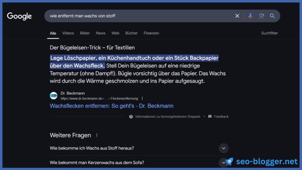 Screenshot eines Featured Snippets (Text-Snippet) für den Suchbegriff „wie entfernt man wachs von stoff“.